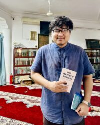 Hussein, Imam, with Jaihoon's book 'The Maverick Dervish', at Al Noor Mosque, the only masjid in Old Quarters, Hanoi